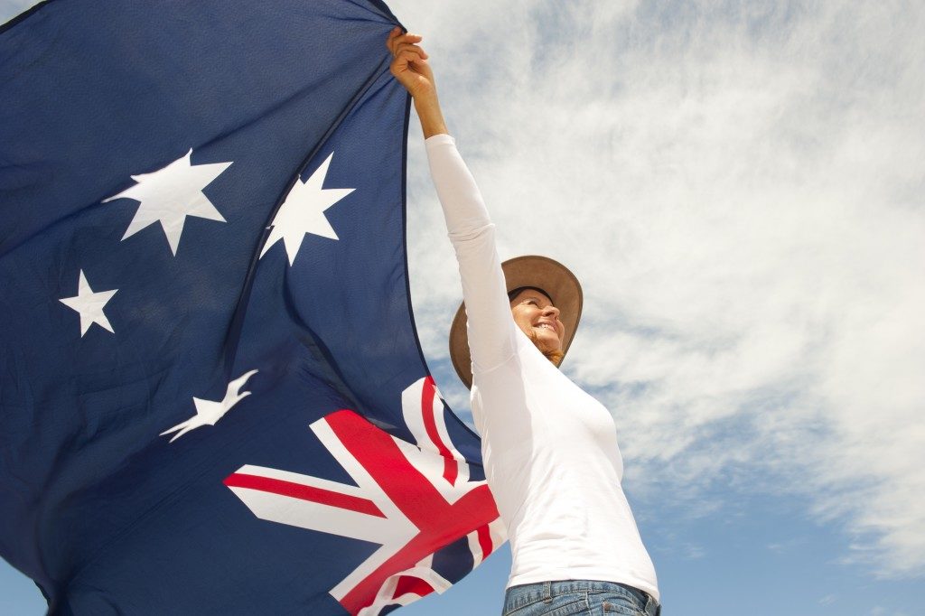 woman holding the flag of australia