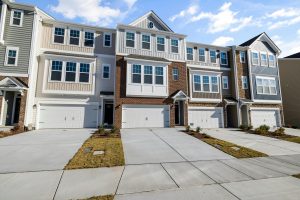 townhouses under clear skies
